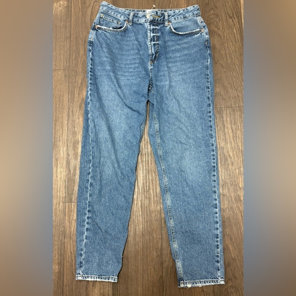 Urban Outfitters BDG Mom High-Rise Jeans in a classic vintage light wash.